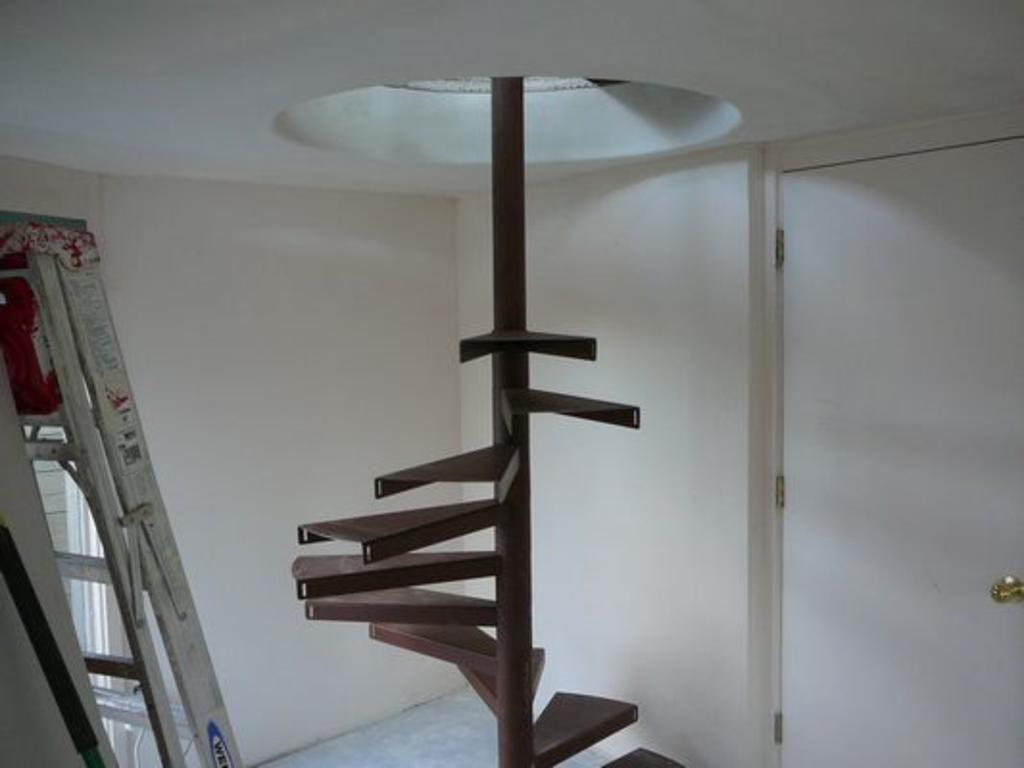 Spiral Staircase addition. I framed opening and owner installed stairs themselves 